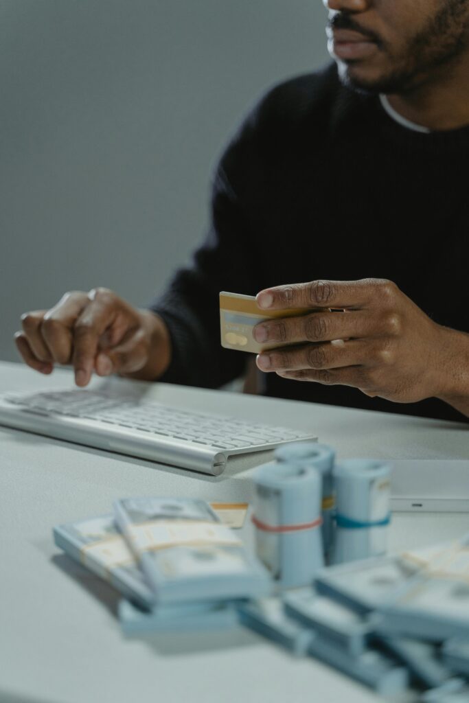 Person Holding a Credit Card